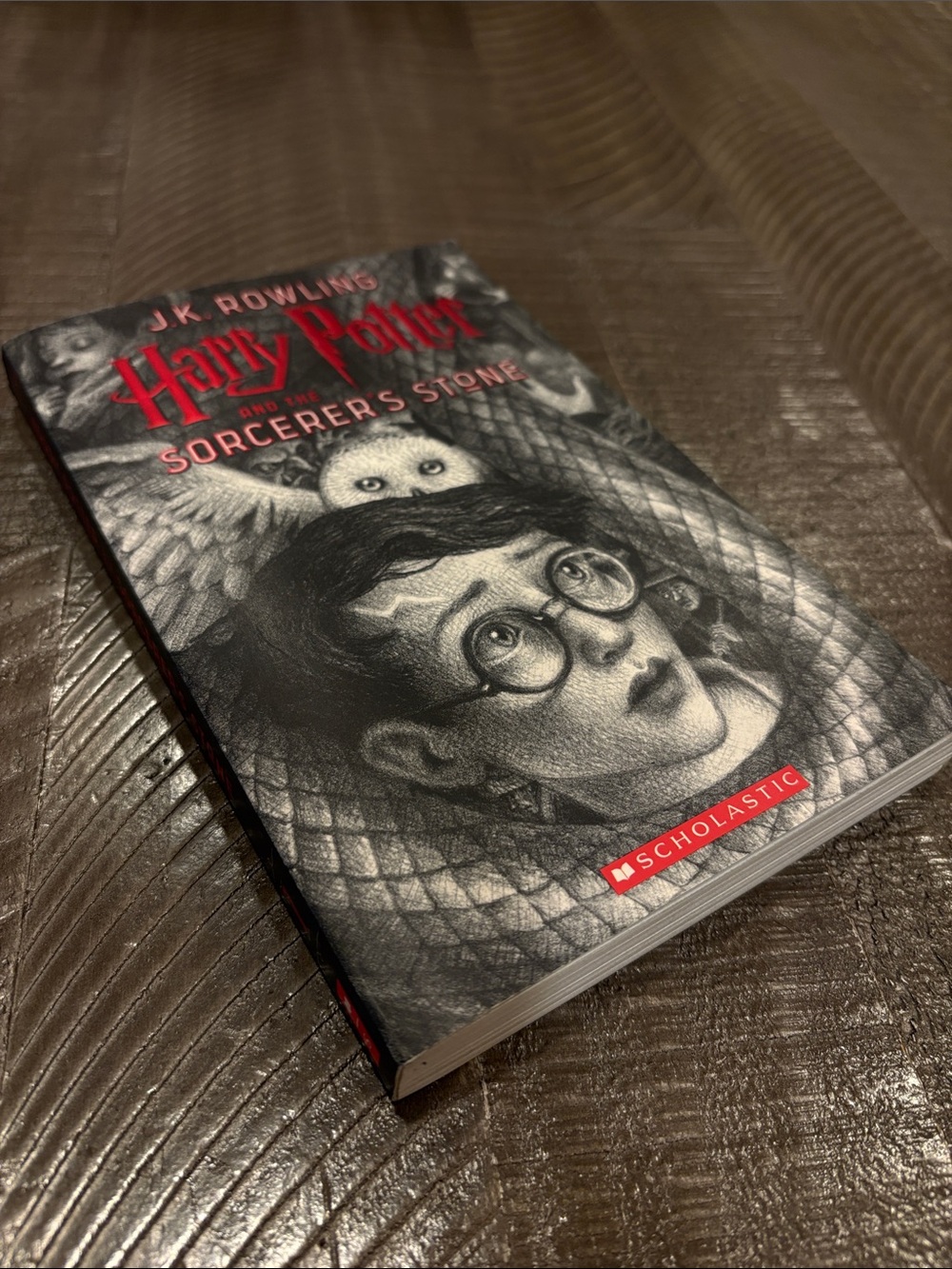 Scholastic Harry Potter Paperback with Black and Red Illustrated Cover
